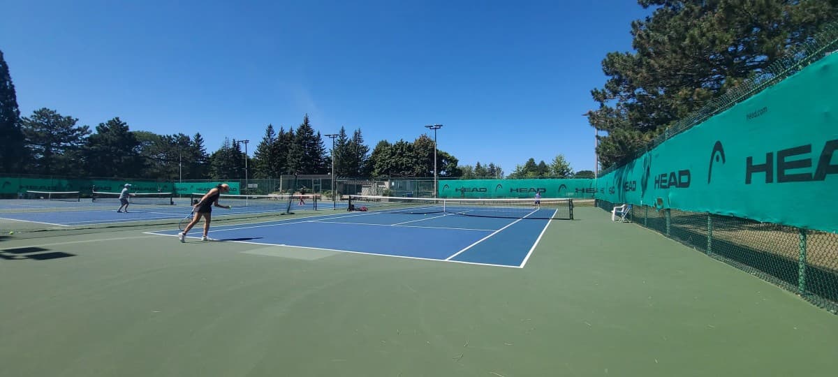 Hillcrest Tennis Camp Releases Program Guide Comparing Specialized Junior Tennis with General Day Camps